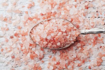 pinch-himalayan-pink-salt-on-wooden-rustic-table-royalty-free-image-611067718-1552314749